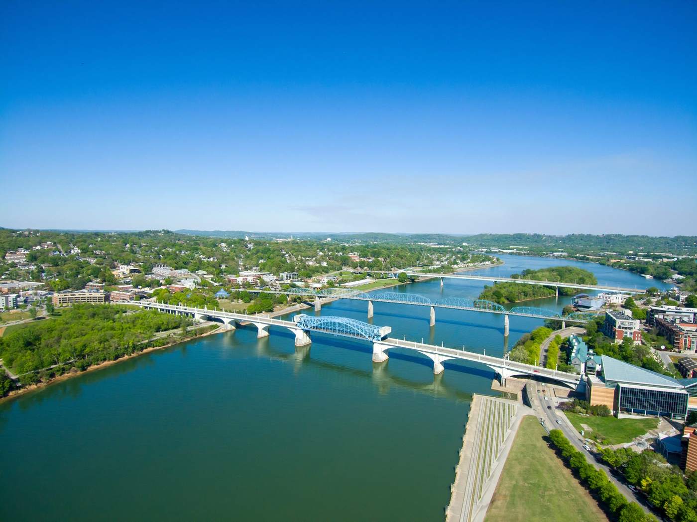 Daylight aerial of the Walnut Street Bridge over the Tennessee River in downtown Chattanooga